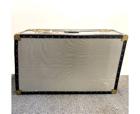 A large Mossman travelling trunk, 82 x 52 x 32cm.