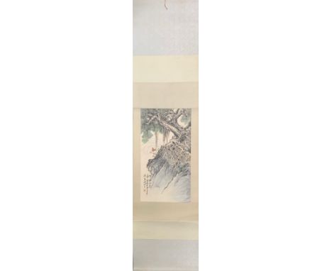 A scroll mounted Chinese ink and watercolour on paper depicting a country view, understood to be attributed to Guan Shanyue, 
