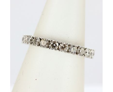 A 14ct white gold diamond set full eternity ring, overall 2ct, (N).
