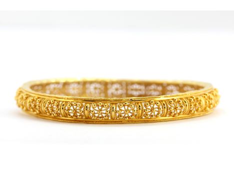 A heavy 22ct yellow gold bangle, dia. 7cm. Weight - 21.4g