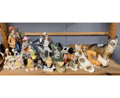 A group of ceramic animal figures and other items.