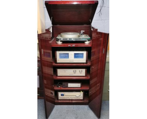 A Marantz music/ stereo cabinet containing a Marantz Esotec Series JT1000 direct drive turntable system (one foot loose), a M