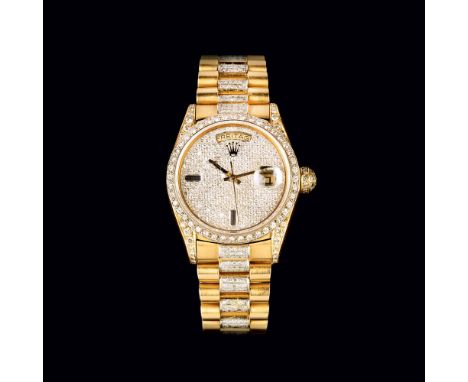 Rolex. Herren-Armbanduhr 'Day Date' mit Diamant-Besatz. 1979/80. 18 kt. GG mit WG, gest., Automatik. Zifferblatt, Armband, Ba