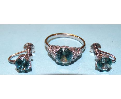 A blue zircon and diamond ring, the claw and millegrain-set stone in 18ct white gold mount, size R, and a pair of blue zircon