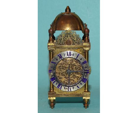 A miniature lantern clock, appears to be constructed from watch parts, in scratch-built wood case, 8cm high. 