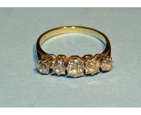 A five stone diamond ring, claw set five old brilliant-cut diamonds in 18ct yellow and white gold mount, K 1/2, 2.7g. 