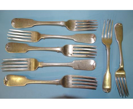 Three George IV silver fiddle pattern table forks, Dublin 1820, maker James England, stamped M West, another, Dublin 1822, ma