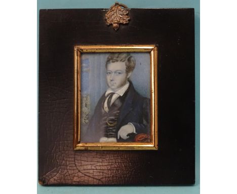 A late-19th century miniature portrait of a young man in&nbsp;a waistcoat with gold chain, on ivory, (no inscription verso), 