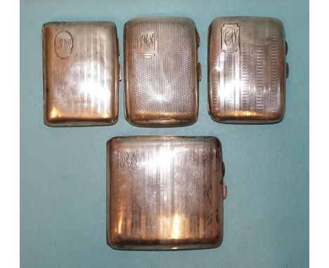 A collection of four silver engine-turned cigarette cases, various dates, all with monograms, total weight ___9oz, (4). 