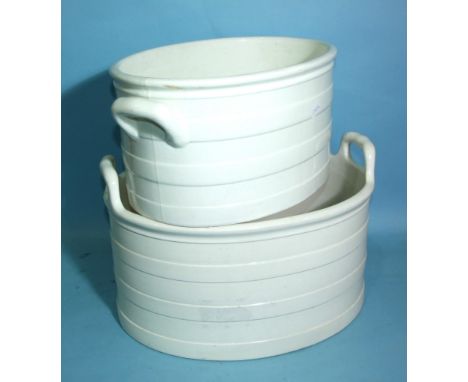 Two smaller foot baths of similar design, 47cm and 45cm wide, the larger stamped Wedgwood, the other Spode, (2). 