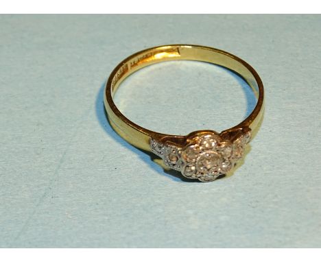An Edwardian diamond ring millegrain-set a cluster of 8/8-cut diamond points, size K, 1.7g. 