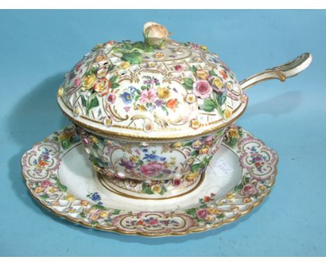A 19th century Meissen porcelain sauce tureen, cover, stand and ladle, decorated with encrusted flowers, (some chipping), cro
