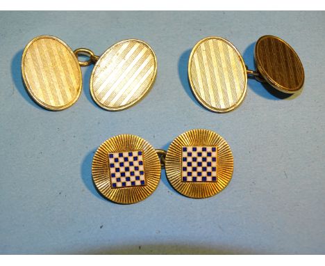 A pair of 9ct gold engine-turned cufflinks, 9g and a single cufflink with enamelled chess board motif, 4.3g. 