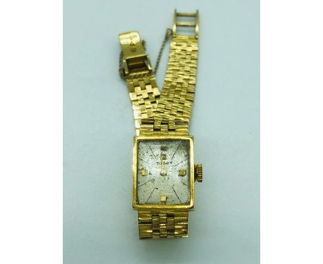 An 18ct Tissot gold watch (Total Weight 32.7g)