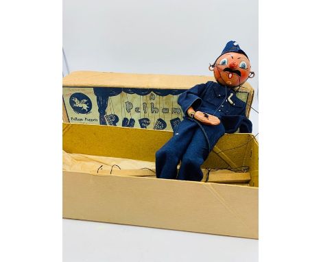 A Vintage Pelham puppet, The Policeman in original box