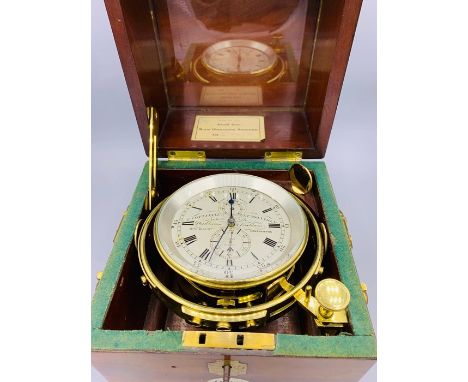 A Mid 19th Century Cased Nautical Chronometer Clock. Parkinson &amp; Frodsham. Dial marked  T Cotterell  &amp; Co London/ ele