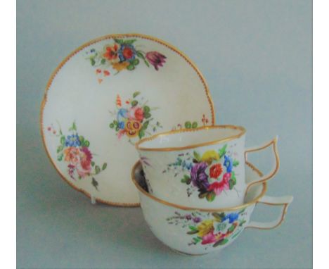 A Spode Trio, moulded and decorated with bright floral sprays, pattern No. 2527 Date circa 1816-20 Size - C.Cup - 7.3 cm diam