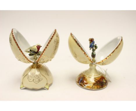 Two heirloom porcelain musical ceramic eggs 