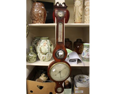 A 19th Century strung flame mahogany barometer, signed C. Searticini, Guildford 