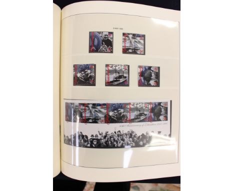 A Tower stamp album containing a mint collection from Guernsey and Alderney.