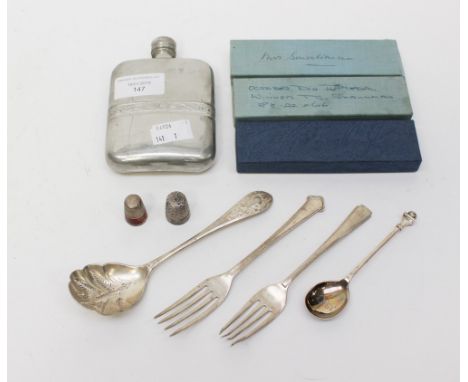 ****Ex Luddington Manor****Two thimbles, one with enamel detail, along with three silver tea spoons, a silver sifting spoon b