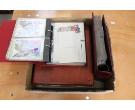 Four albums containing Post Office stamp postcards and stamp booklets including Tolkien. (4)