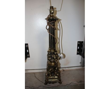 A large Corinthian column gilded, table lamp with putti around the base (1) 