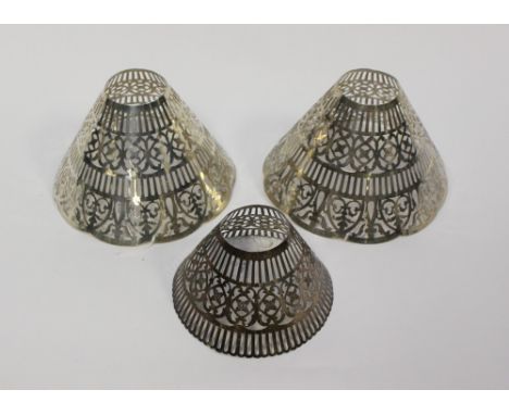  A set of three white metal pierced lamp shades of various sizes, total weight 229 grams/7.38 ozt approx (3) 