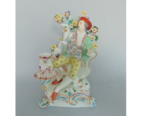 A Samson Porcelain Candlestick figure of a Gent Circa 1890Size - 24 cm high approx Condition - Arm of Sconce and Fingers Rest