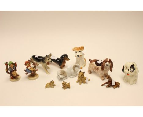 Two Hummel figures, Nao, 1930s Crown Devon dog, Wade, Sylvac, etc. (12)