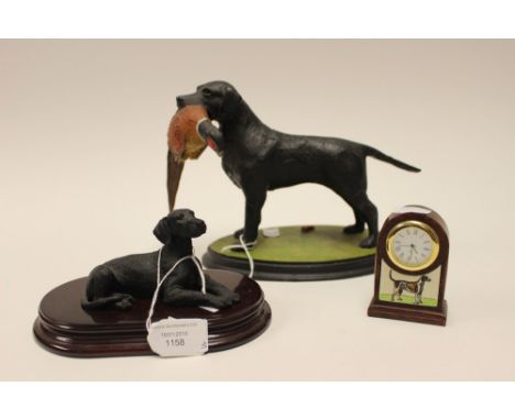 J. Woodcock limited edition black Labrador with Pheasant mounted; together with Italian black Labrador in plinth and a small 