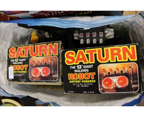 A pair of boxed Saturn thirteen inch robots, together with an unboxed example and an unboxed, 2002, 2 model-B robot, China ci
