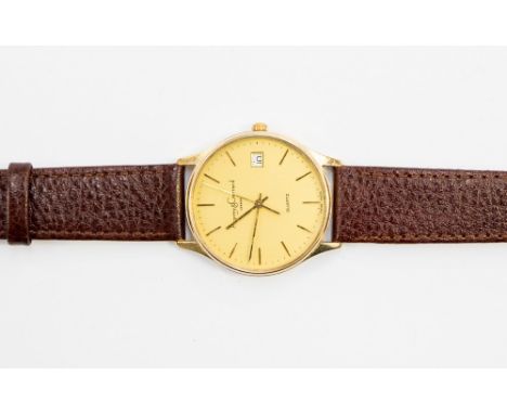  A gentlemen's Asprey and Garrard, London wristwatch, quartz movement with baton numerals and date aperture, yellow metal cas