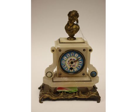 A French white alabaster clock on gilt metal base, bronze bust of a lady as a finial, hand painted enamelled dial, metal moun