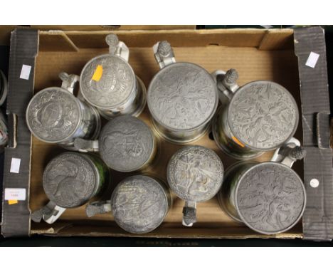 A collection of Steins to include Royal Worcester, Nelson Commemorative, Franklin Mint etc, birds and scenes pewter tops (9) 