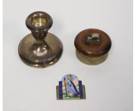 A Birmingham enamel on silver St Christopher 'badge' 1921 two shillings and a weighted squat candlestick Birmingham 1978 toge