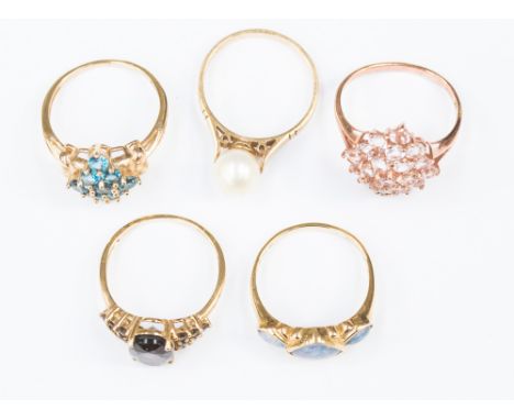 A collection of five 9ct gold dress rings, to include a rose gold cluster set with quartz, an opal ring set with three opal t