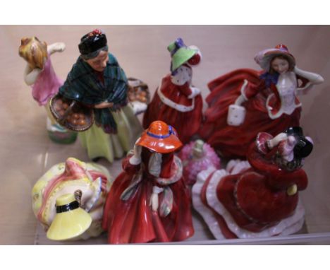 Royal Worcester figurine 'Wednesdays Child', together with Royal Doulton figurines 'The Orange Lady' HN1953, 'Christmas Time'