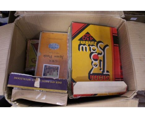 A quantity of vintage jigsaws, including Cunard RMS Aquitania, GWR examples, etc.