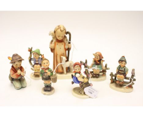 A large Hummel figure of a child 'Christ' with shepherds crook and lambs, six various Hummel figurines, three a/f with chips 