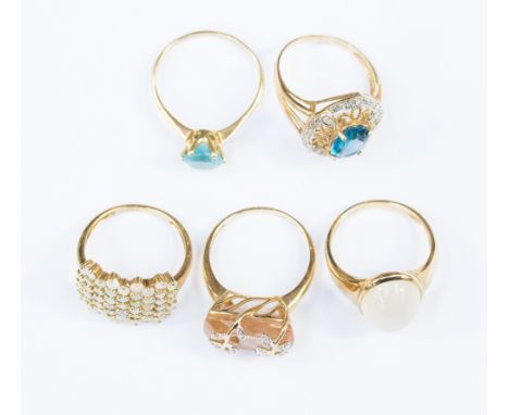 Five 9ct gold dress rings, topaz, opal, tourmaline and moonstone set with a combined total gross weight of approx 21.2gms