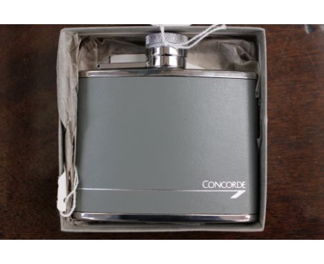 A Concorde hip flask in faux leather