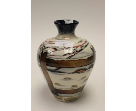 A Moorcroft vase in the 'Who Goes There' pattern, 1st quality vase in unusual colourway, designed by and signed to the base b