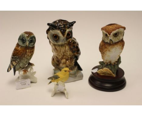 Continental bird figures, to include Kaiser, Goebel, etc. Owls and Greenfinch (4)