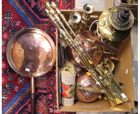 A pair of brass candlesticks, together with a brass oil lamp, a companion set, a chandelier, two brass beer taps, two copper 