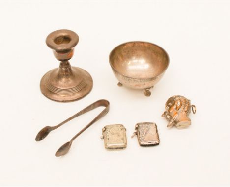 A novelty 'elf' head' match striker with a silver trinket pot, approx 2.21ozt, a squat silver candle stick, a silver match st