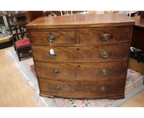 ****Ex Luddington Manor****An early 19th Century bow fronted mahogany chest of drawers, fitted with five drawers in total, 10