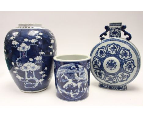  A large Chinese blue and white jar, together with a large Chinese moon flask, and a white pot decorated with oriental figure