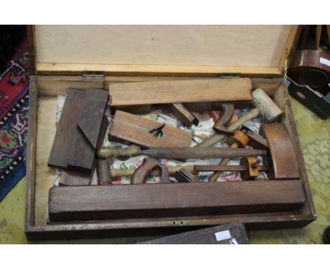 Two wooden tool chests, containing old woodworking tools 