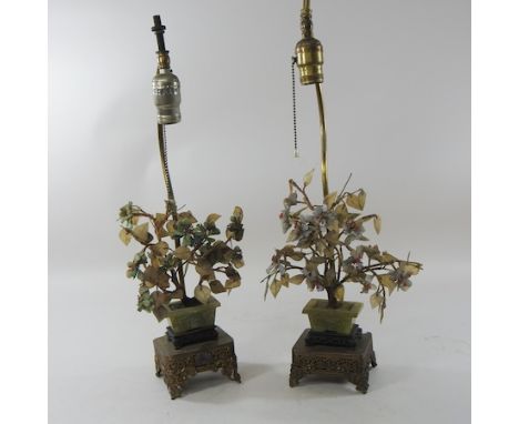 A pair of jade coloured stone table lamps, 52cm high